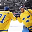 MOSCOW, RUSSIA - MAY 6: Sweden's Linus Klasen #86 celebrates at the bench with Jimmie Ericsson #21 during preliminary round action against Latvia at the 2016 IIHF Ice Hockey Championship. (Photo by Andre Ringuette/HHOF-IIHF Images)

